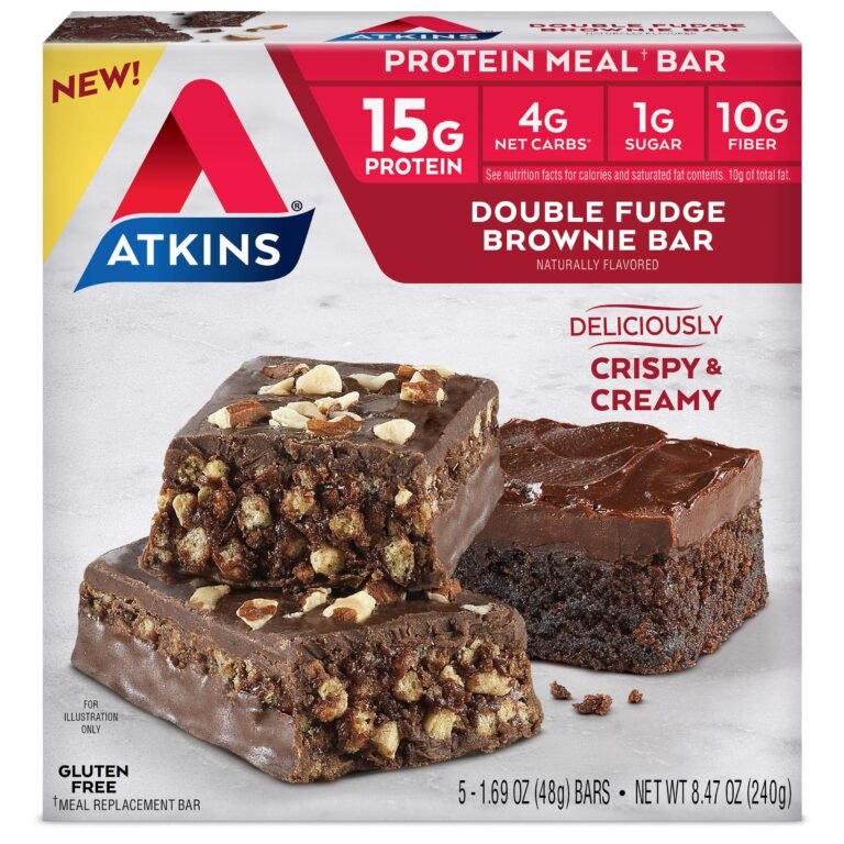 Atkins Double Fudge Brownie Bar with nuts, stacked on a box